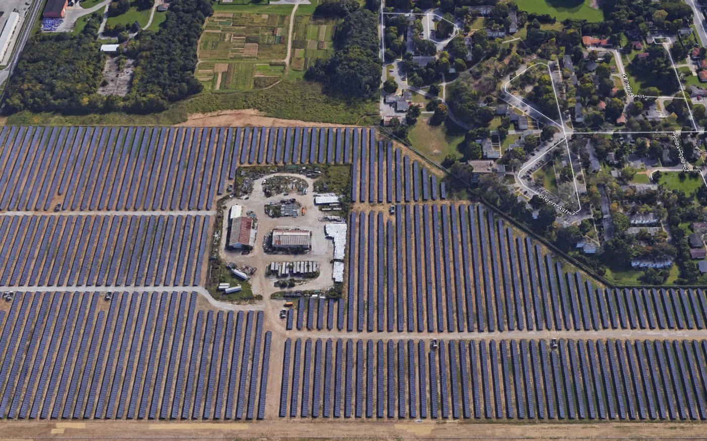 Aerial view of the completed single-axis tracker rows of the IMS ground-mount solar plant, Indianapolis, Indiana